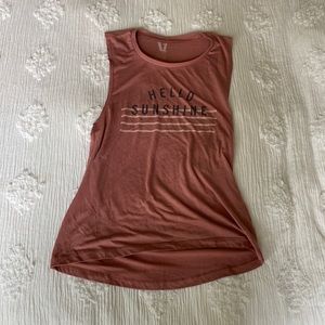 Vibrant and colorful shirt perfect for yoga.